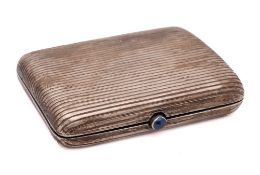 A silver cigarette case possibly Russian, stamped 900: of rectangular outline,