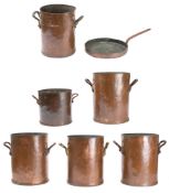 A collection of five large copper cooking pots: one stamped Savoy Hotel,