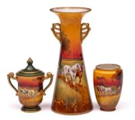 Three Royal Doulton vases: one of two handled tapering cylinder form with flaring rim,