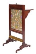 An Edwardian mahogany and silkwork firescreen, early 20th century,: of rectangular form,