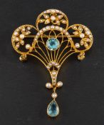 An openwork seed pearl and blue paste Belle Époque style brooch/ pendant,: stamped '9ct', length ca.