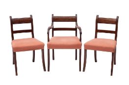 A composed set of five George III mahogany dining chairs, early 19th century,