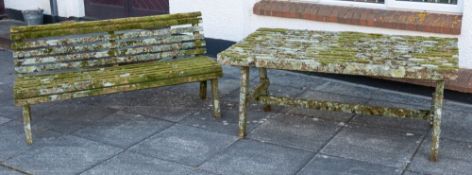 A teak garden table and seat, 20th century,