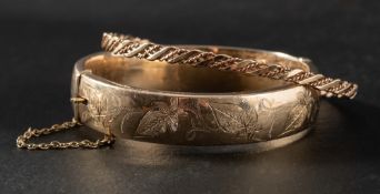 Two 9ct gold bangles,: a ropetwist bangle, hallmarks for London, inner diameter ca. 6.