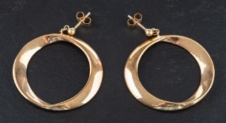 A pair of 9ct gold, flattened hoop earrings,: hallmarks for Sheffield,