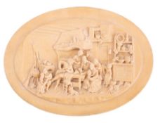 A 19th century reconstituted stone low relief oval plaque: depicting an 18th century cottage