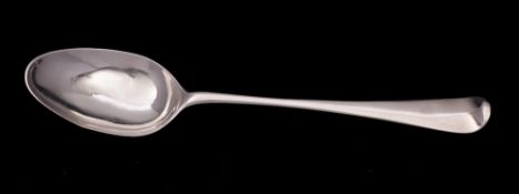 A George II silver Hanoverian pattern serving spoon, maker William Young, London, 1742: crested, 28.