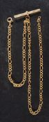 A figaro-link chain with T-bar,: stamped '375', length ca. 47cm, total weight ca. 16.8gms.