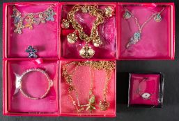Six necklaces, a bangle, a bracelet and a brooch by Butler and Wilson,