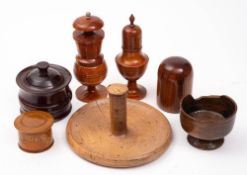 An early 19th century circular treen spice box and cover: bears paper label 