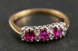 An 18ct gold pink sapphire and round, brilliant-cut diamond ring,