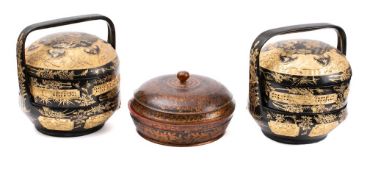 Two Chinese black and gilt lacquered twin section rice containers: of circular outline decorated