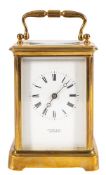 A Victorian French brass carriage clock: the eight-day duration movement having a platform cylinder