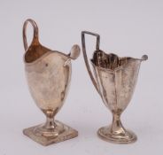 A George III pedestal cream jug, maker Peter & Ann Bateman, London, 1793: of helmet type,