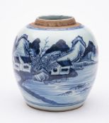 A Chinese blue and white jar: painted with a mountainous lake landscape with a fisherman and