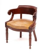 A 'Regency Empire' mahogany and leather upholstered desk chair, early 19th century,: of tub form,