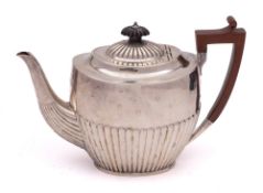 A late Victorian silver teapot, maker Atkin Brothers, Sheffield, 1891: crested,