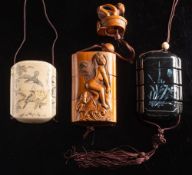 A 20th century Japanese boxwood three-section inro: carved in low relief with a nude female bathing