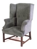 A teal upholstered wing armchair in George II style, late 19th /early 20th century,