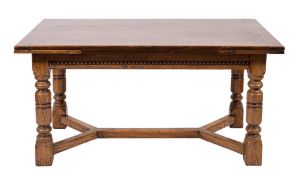 An oak draw leaf refectory table in early 17th century taste, early 20th century,