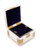 A Victorian onyx and brass mounted jewellery box: of square outline,