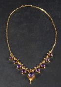 A seed pearl, fringe necklace with amethyst pendants,: stamped '9ct', total length ca.