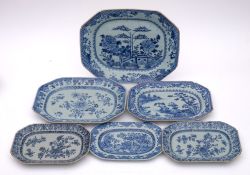 A group of six Chinese blue and white octagonal dishes: painted with floral sprays,