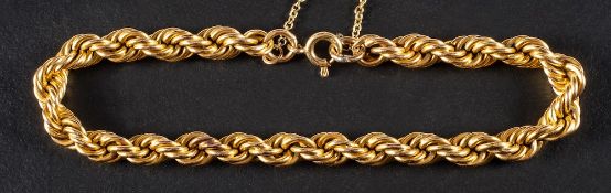 A ropetwist bracelet,: stamped '750', length ca. 18.5cm, total weight ca.9.5gms.