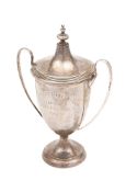 A George VI silver twin handled trophy cup and cover, maker Adie Brothers Ltd,