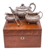 A late Victorian silver three-piece tea set, maker James Dixon & Sons Ltd, Sheffield,