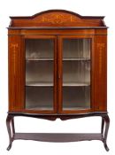 An Edwardian mahogany and marquetry bowfront display cabinet, early 20th century,
