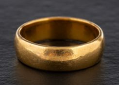 A 22 carat gold wedding band,: with full Birmingham hallmarks, ring size R 1/2, 9.