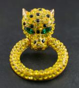 Six cat brooches, a cat keyring and a cat necklace by Butler and Wilson,