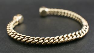 A plaited torque bangle:, inner diameter ca. 6cm, total weight ca. 39.4gms.