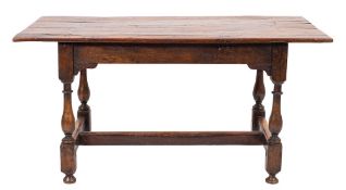 An oak trestle table in 17th century style, late 19th / early 20th century,
