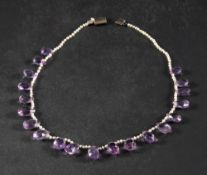 A seed pearl fringe necklace with briolette-cut amethyst pendants,: total length ca. 40cm.