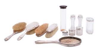 A mixed collection of silver mounted dressing table wares,
