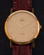 An 18ct gold Omega de Ville Ultra Thin wristwatch: the round dial with baton hour markings and