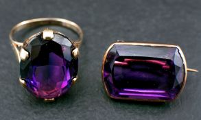 An amethyst brooch and 9ct gold synthetic colour change sapphire ring,