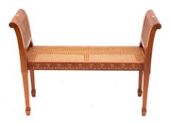 A mahogany and canework window seat in George III Sheraton style, by Brights of Nettlebed, modern,