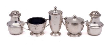 A pair of George V silver pepperettes, maker Z Barraclough & Sons, London, 1934: of baluster form,