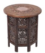 A south Asian, probably Burmese carved hardwood and brass marquetry occasional table, circa 1900,