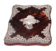 A late Victorian tortoiseshell and silver mounted blotter: bears marks for William Comyns & Sons,