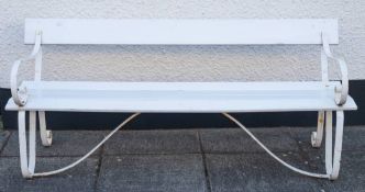 A painted wood and wrought iron garden seat, circa 1900,