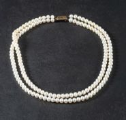 A double row, cultured pearl necklace,: the cultured pearls of white hue with pinkish overtones,