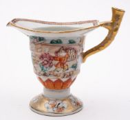 A Chinese export famille rose jug: of helmet shape with gilt stalk handle,
