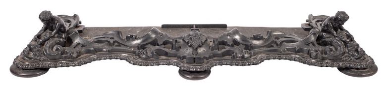 A Victorian cast iron fender in Rococo revival style, possibly Coalbrookdale Foundry,