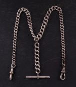 A silver Albert pocket watch chain: curb link marked for silver, with silver bar,
