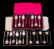 A set of six George V silver coffee spoons and sugar tongs, maker Josiah Williams & Co, London,