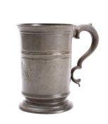 A late 18th century quart pewter flagon: of cylindrical outline,